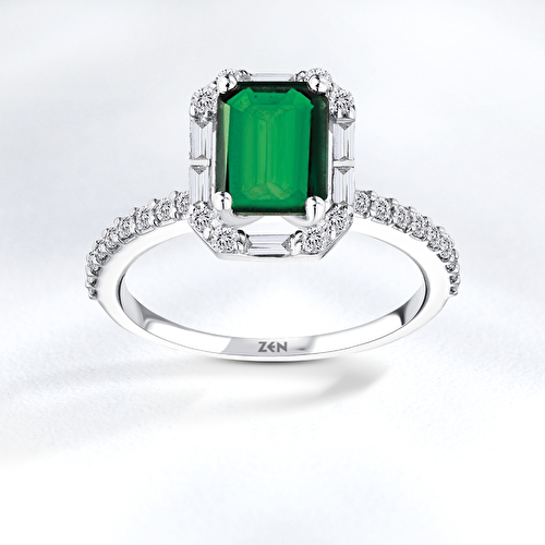 Chris standing up holding his daughter Elva