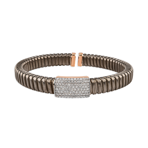 Chris standing up holding his daughter Elva