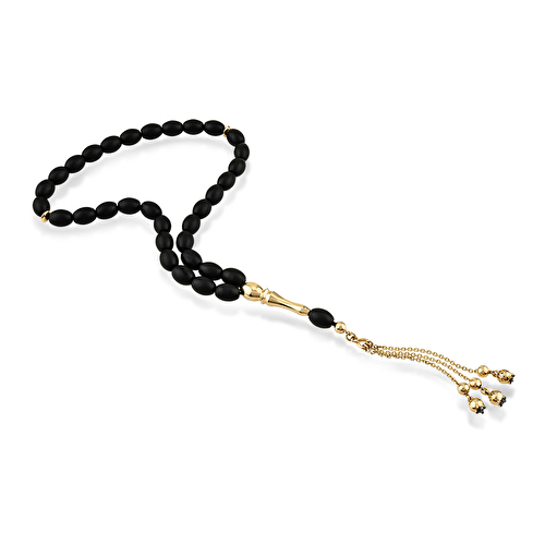 Chris standing up holding his daughter Elva