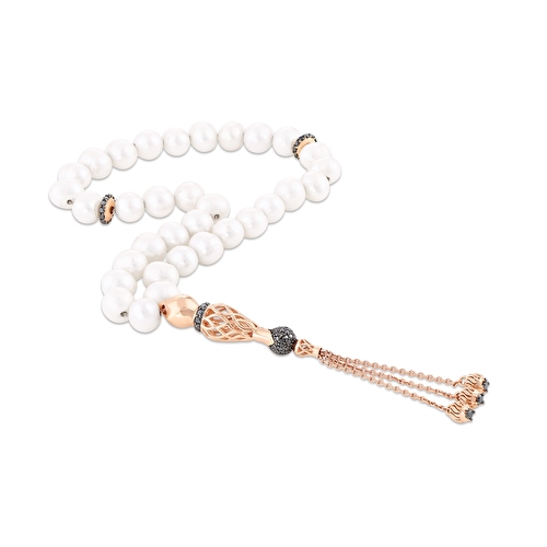 Chris standing up holding his daughter Elva